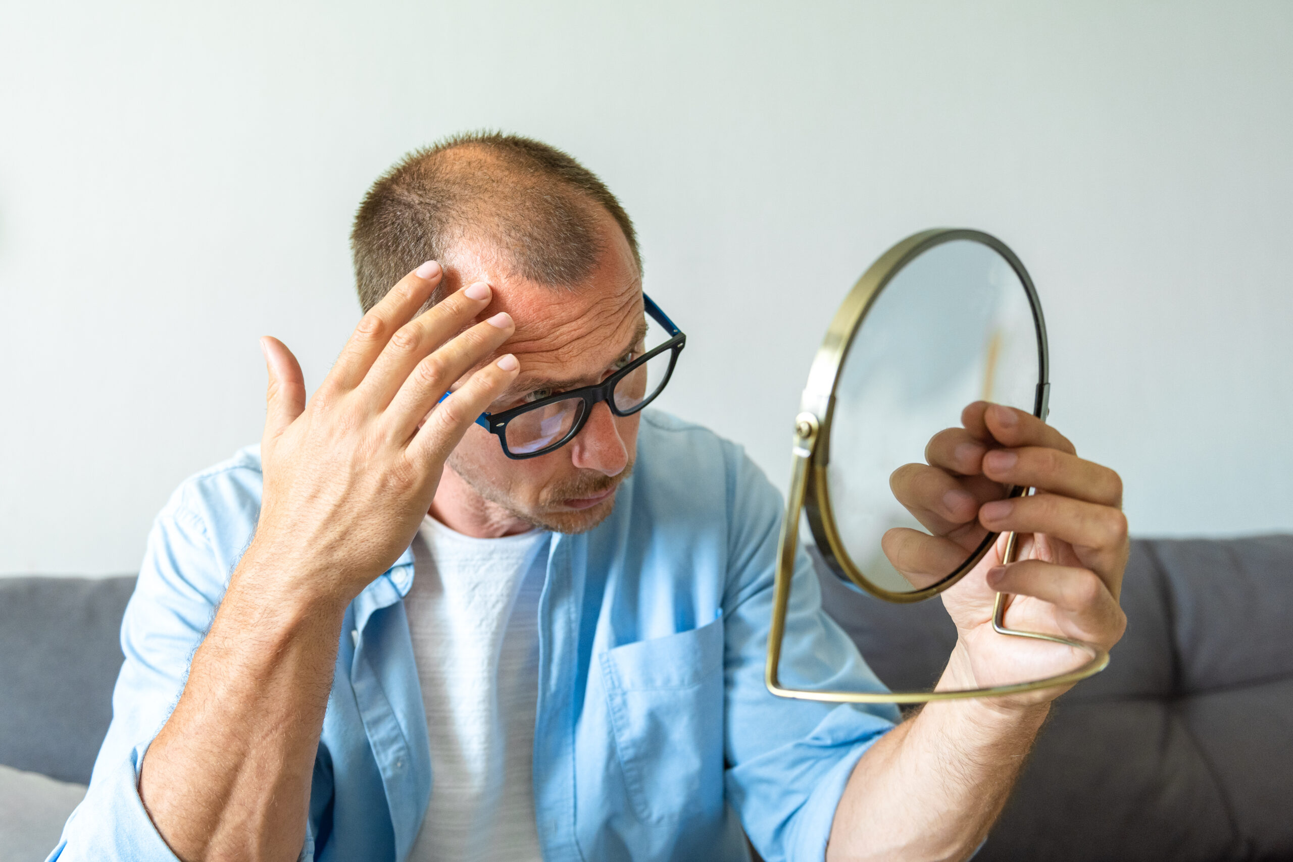 Causes of Hair Loss and Balding in Men and What Are the Solutions?